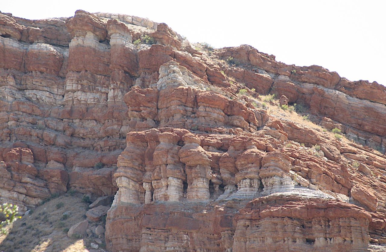 Red Rock Canyon State Park, showing the distinctive layered rock formations, showcasing the dramatic red and orange sedimentary layers that give the park its name.